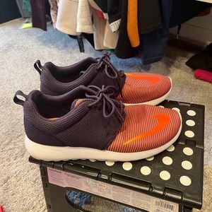 Nike purple/orange running shoes